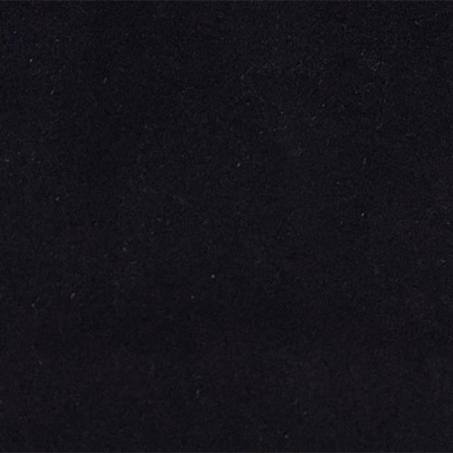 Nearly black dark navy plain fabric with a fine, dense matte texture