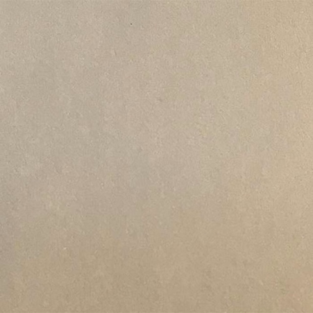 Soft ecru plain fabric swatch with a smooth matte surface