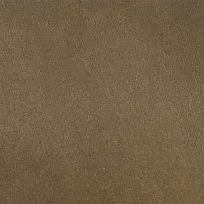 Close-up of a warm latte-brown plain fabric with a soft, lightly mottled texture