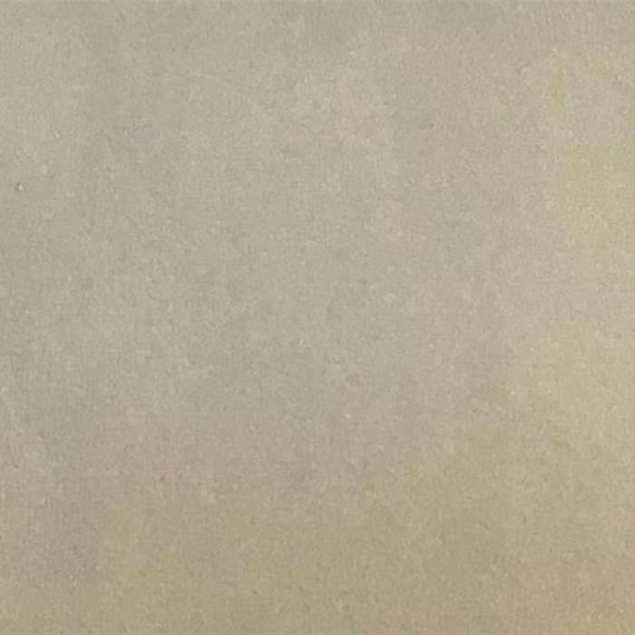 Close-up of a smooth mushroom beige plain fabric swatch