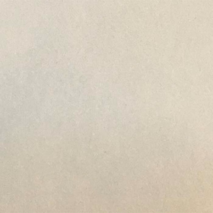 Pale warm ivory plain upholstery fabric with a smooth matte surface