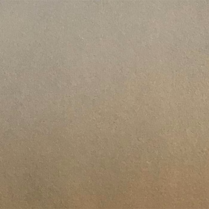Close-up of a plain soft grey taupe fabric swatch with a smooth matte finish.