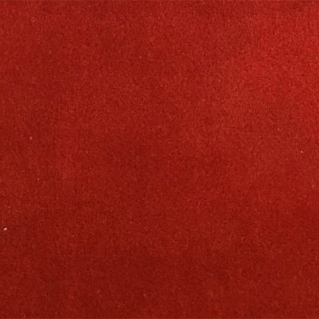 Deep burnt red plain fabric swatch with a soft, matte-looking surface