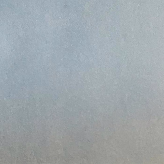 Pale sky blue plain fabric swatch with a soft matte finish