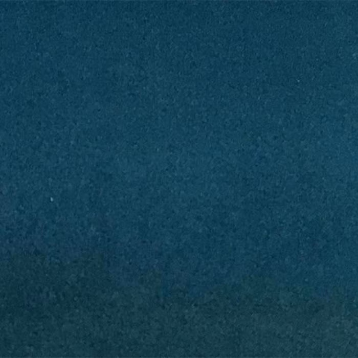 Deep teal plain fabric swatch with a soft, velvety texture