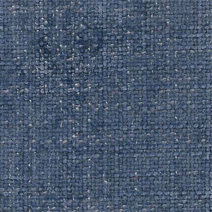 Close-up of muted denim blue plain fabric with a nubby woven texture