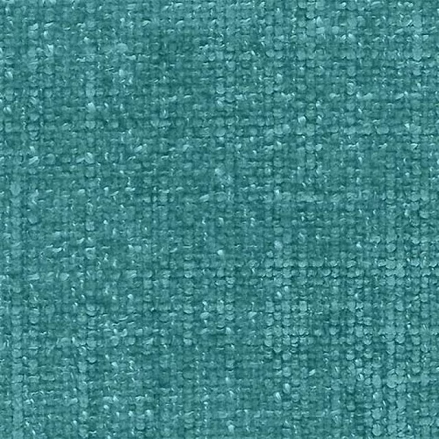 Close-up of emerald teal plain woven fabric with a textured surface