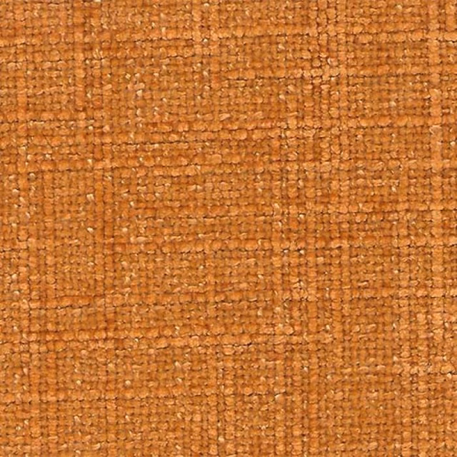 Close-up of a warm pumpkin-orange woven plain fabric with textured slubs
