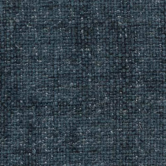 Close-up of deep blue-teal woven plain fabric with a textured, speckled surface