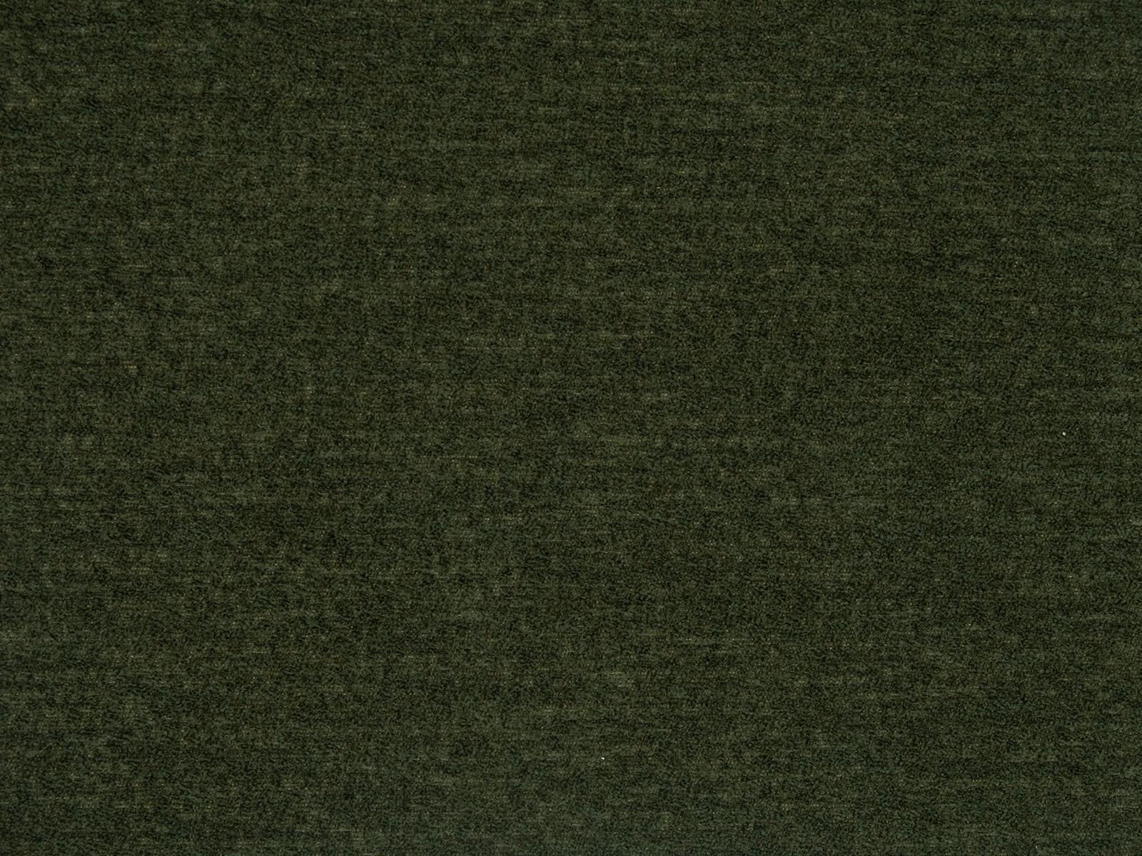 Deep bottle green plain fabric swatch with a softly mottled matte texture