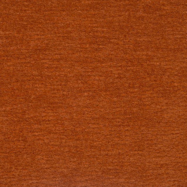 Warm copper-orange plain upholstery fabric with subtle brushed texture