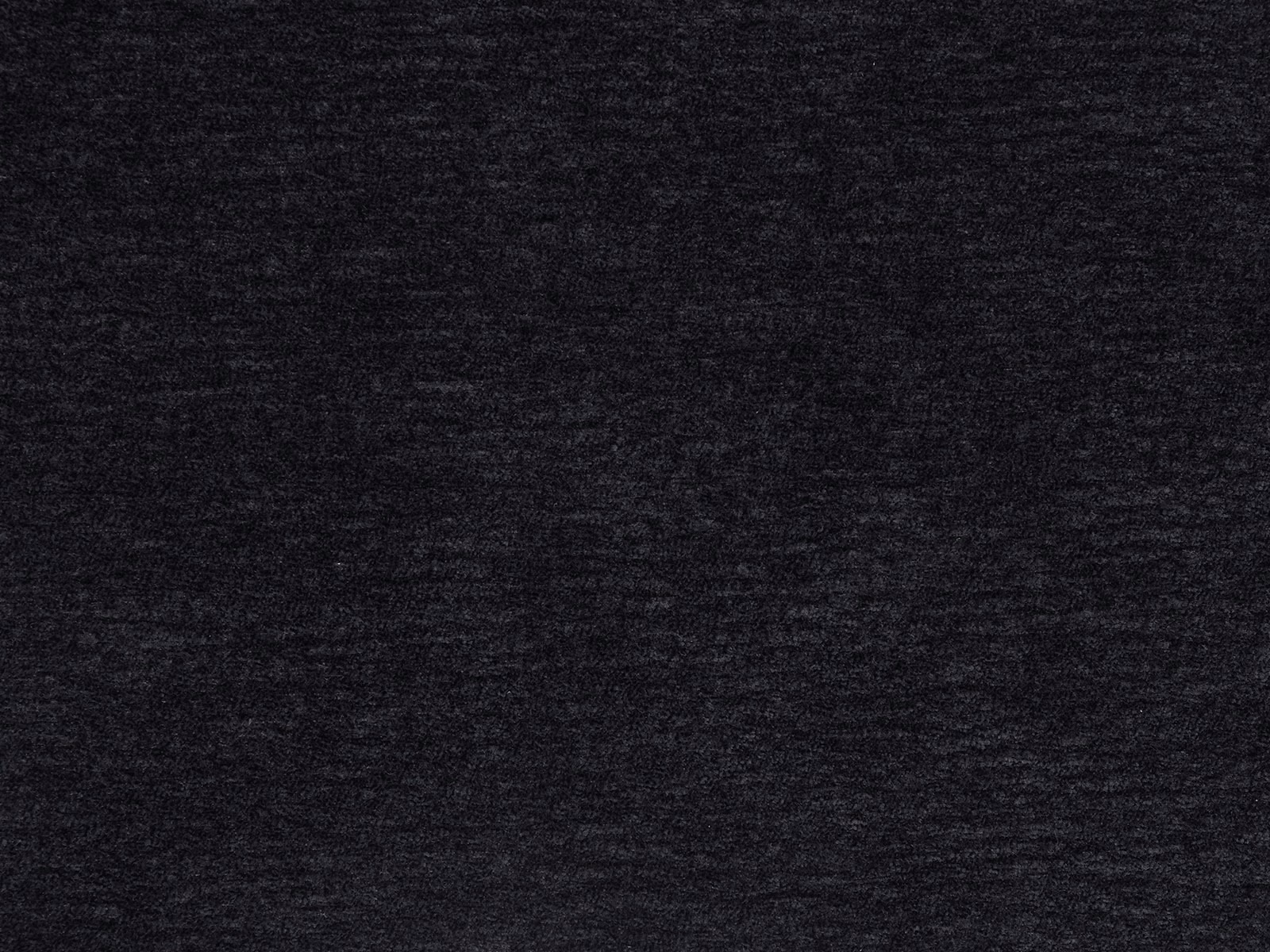 Dark indigo plain woven fabric swatch with a subtly mottled texture