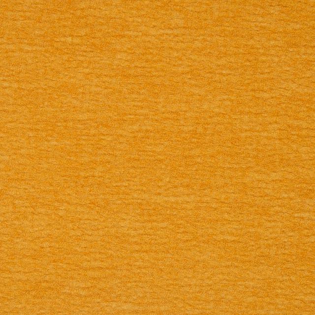 Warm ochre-gold plain fabric swatch with a softly brushed texture