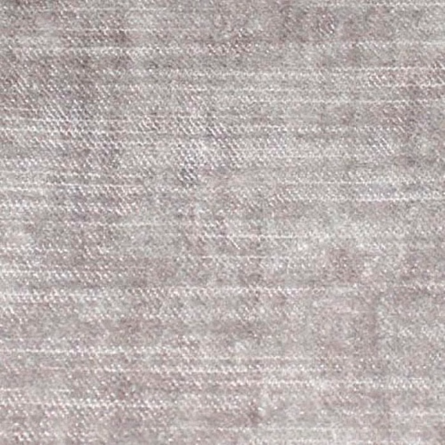 Close-up of a soft chrome-grey plain weave with fine horizontal texture