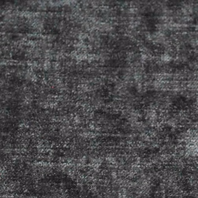 Close-up of a dark charcoal marl grey plain fabric with mottled texture