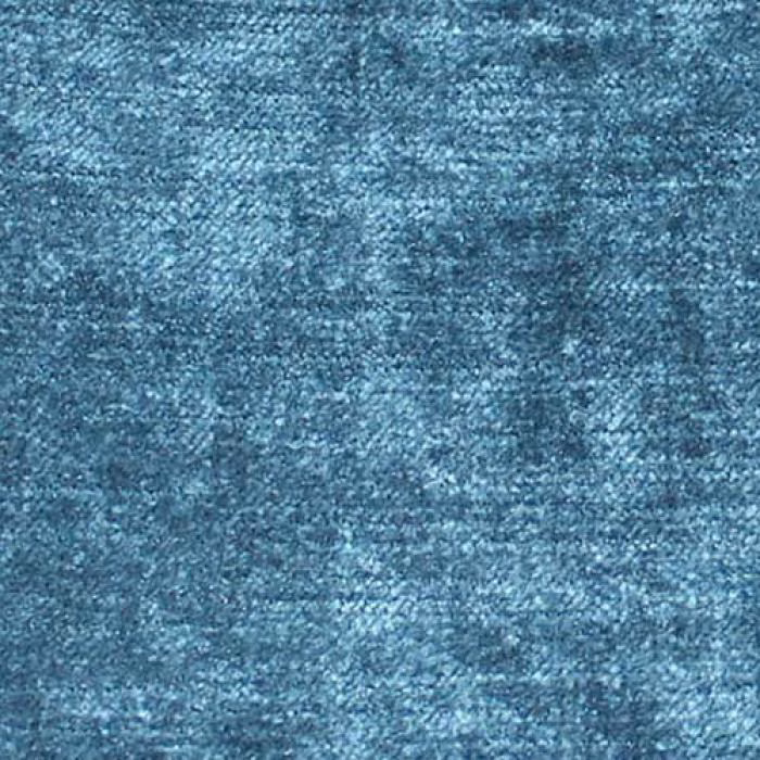 Close-up of a mottled petrol blue plain woven fabric with soft sheen