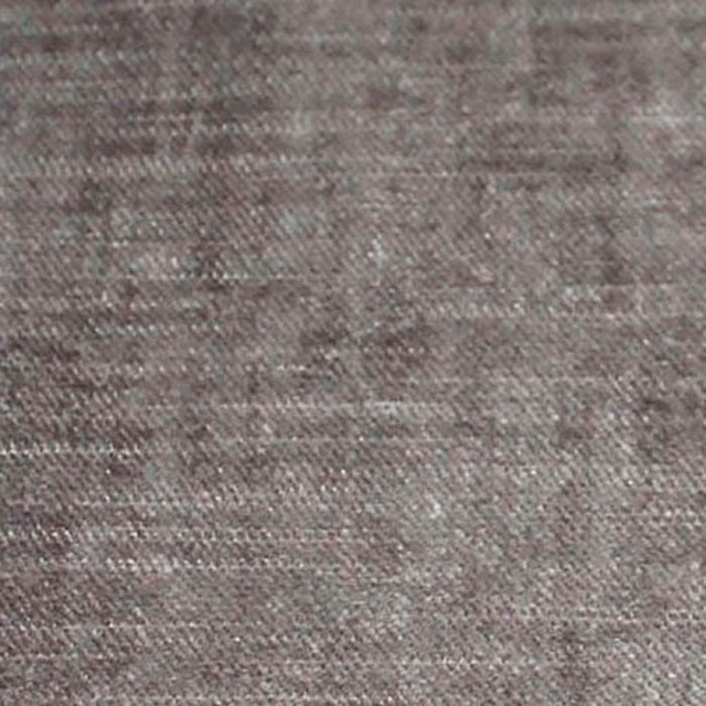 Close-up of a soft pewter grey plain weave fabric with subtle mottled texture
