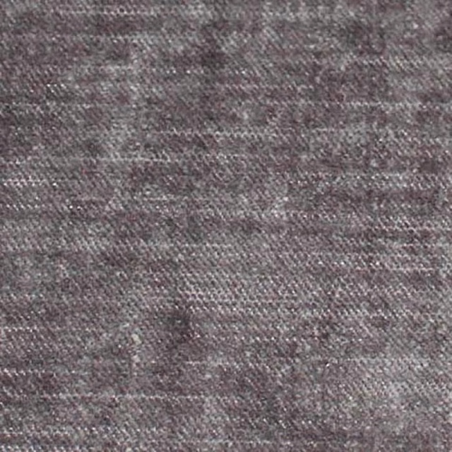 Close-up of mottled warm grey plain fabric with subtle woven texture