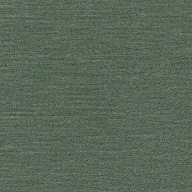 Close-up of muted vintage green plain woven fabric with soft texture