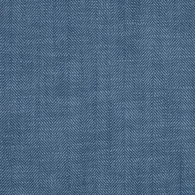 Blue herringbone chambray fabric swatch with fine woven texture