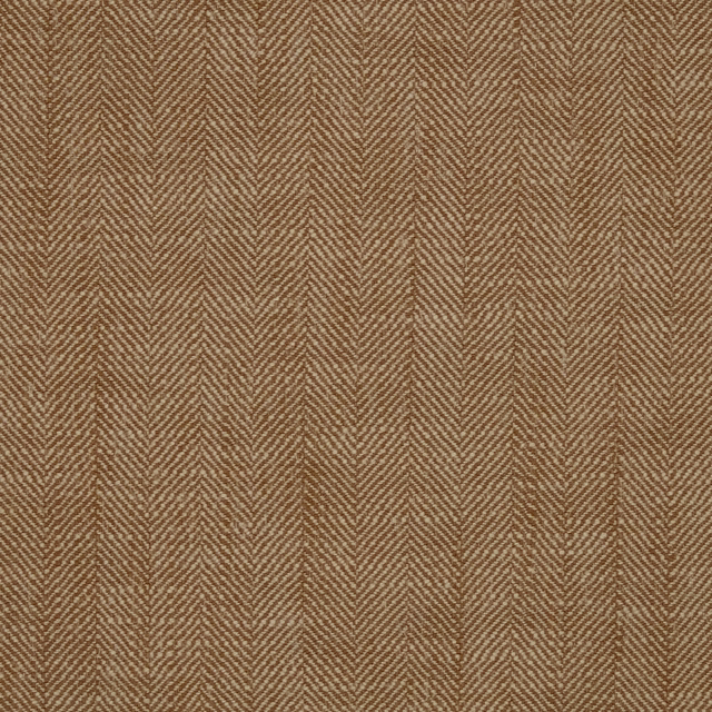 Warm cinnamon-brown woven fabric with fine herringbone texture and subtle natural yarn slubs