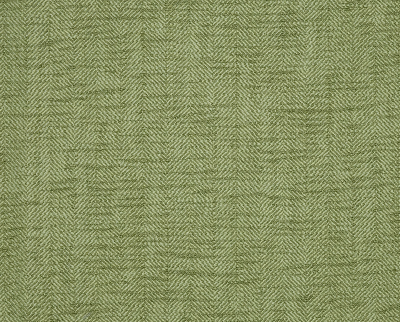 Muted kiwi green woven fabric with fine diagonal herringbone texture