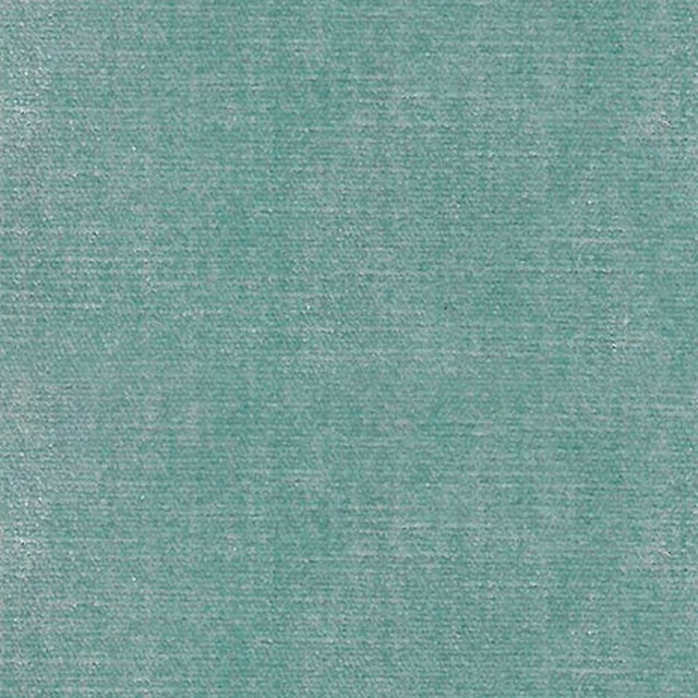 Close-up of a soft peppermint teal plain fabric with fine woven texture