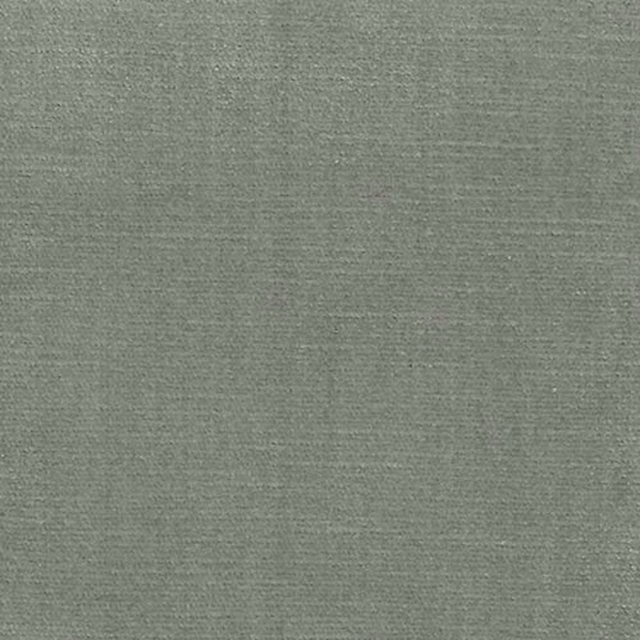 Close-up of muted sage-green plain woven fabric with a fine textured finish