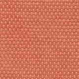 Dusty coral pink plain weave fabric with small dappled texture
