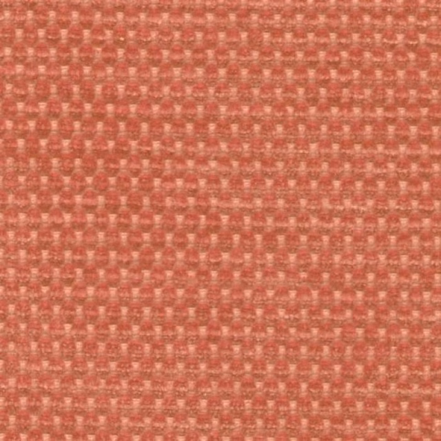 Dusty coral pink plain weave fabric with small dappled texture