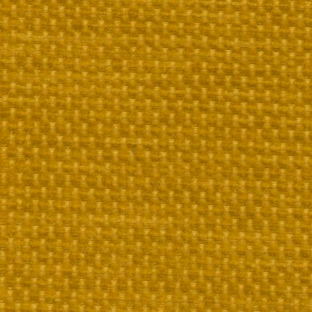 Close-up of a mustard yellow plain weave fabric with small textured blocks