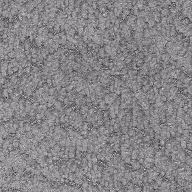 Close-up of a soft misty grey textured plain fabric with flecked pile