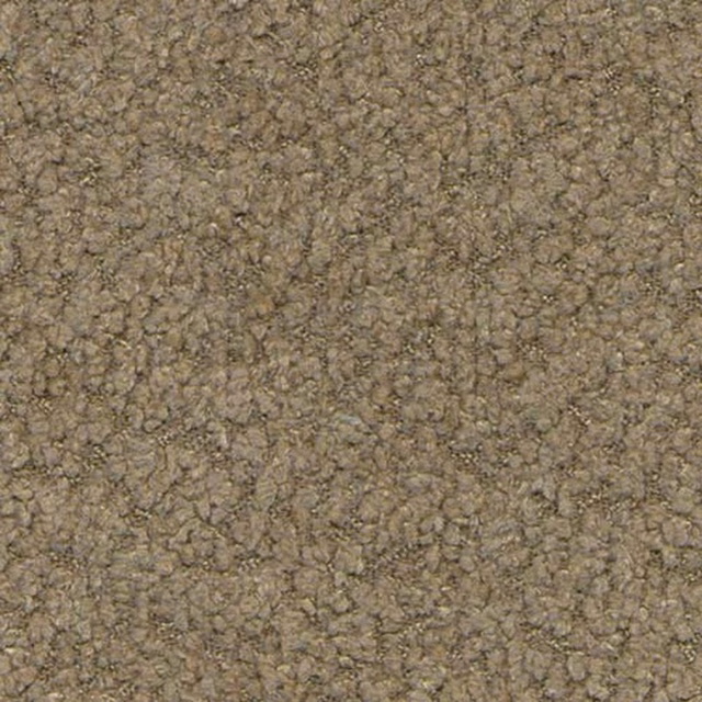 Close-up of warm russet beige textured plain fabric with a nubby weave