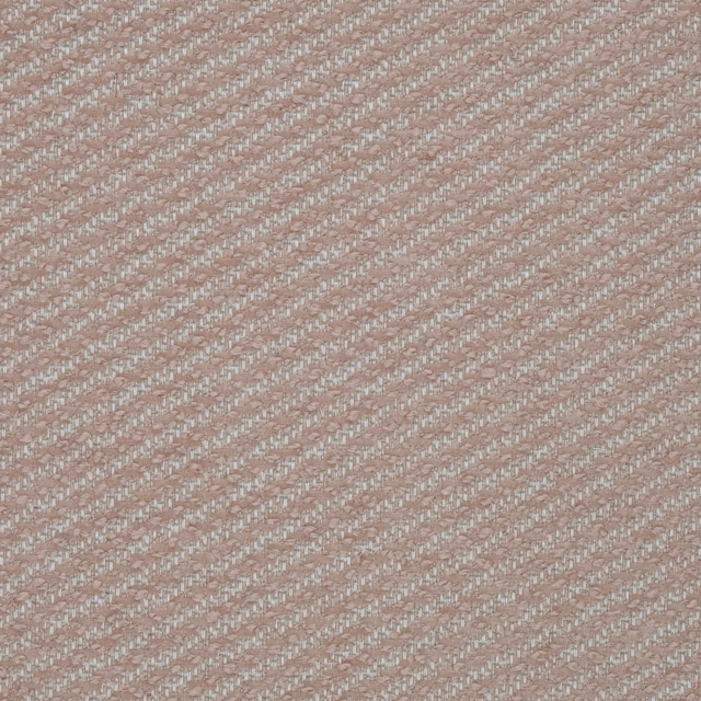 Close-up of soft blush pink diagonal woven fabric with subtle flecked texture