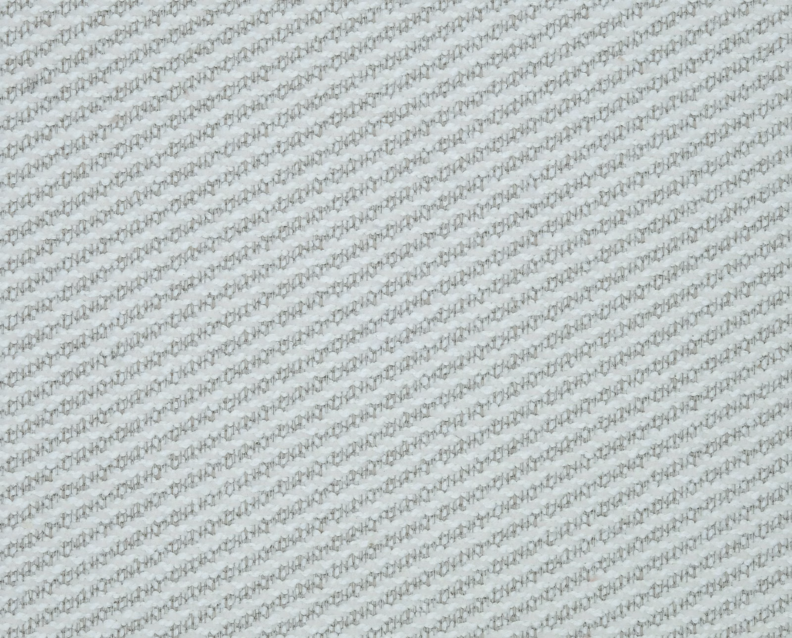 Pale ivory woven fabric with fine diagonal texture and subtle flecking