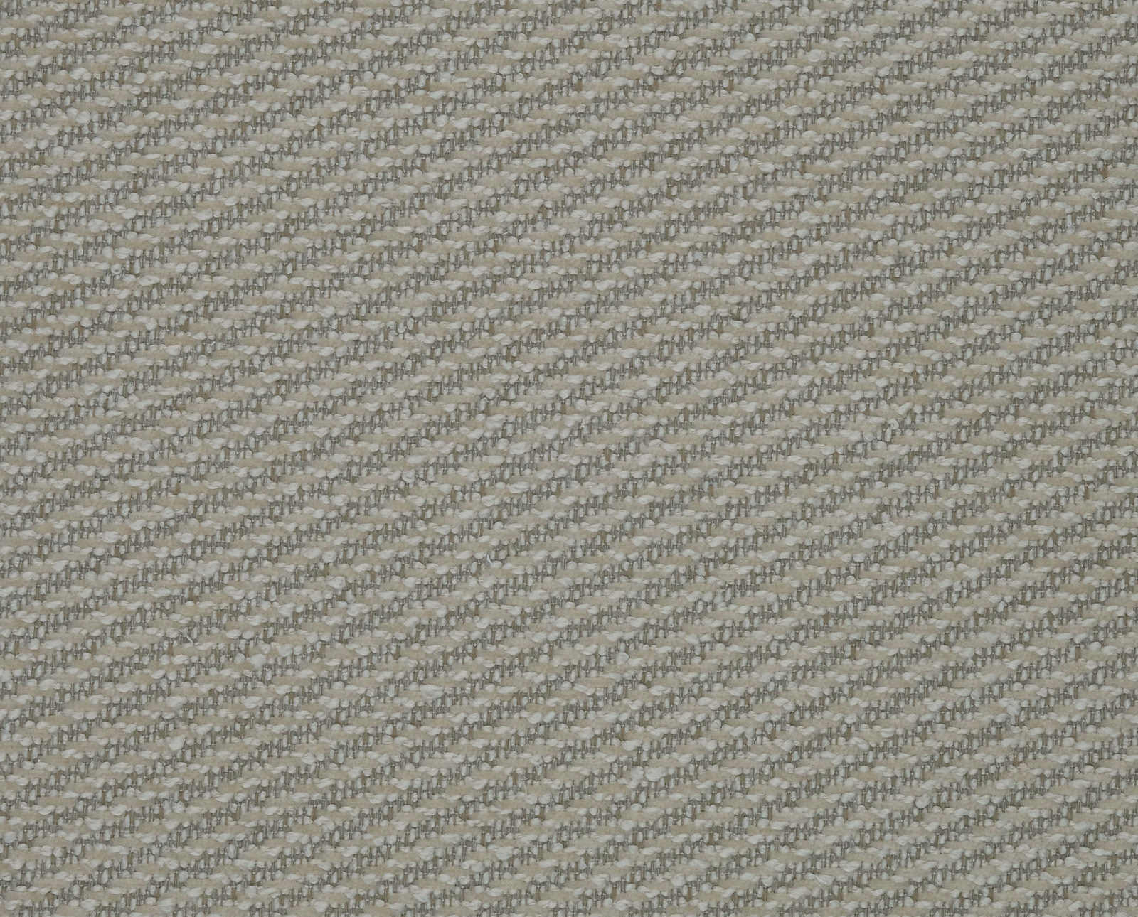 Close-up of oatmeal beige woven fabric with fine diagonal texture