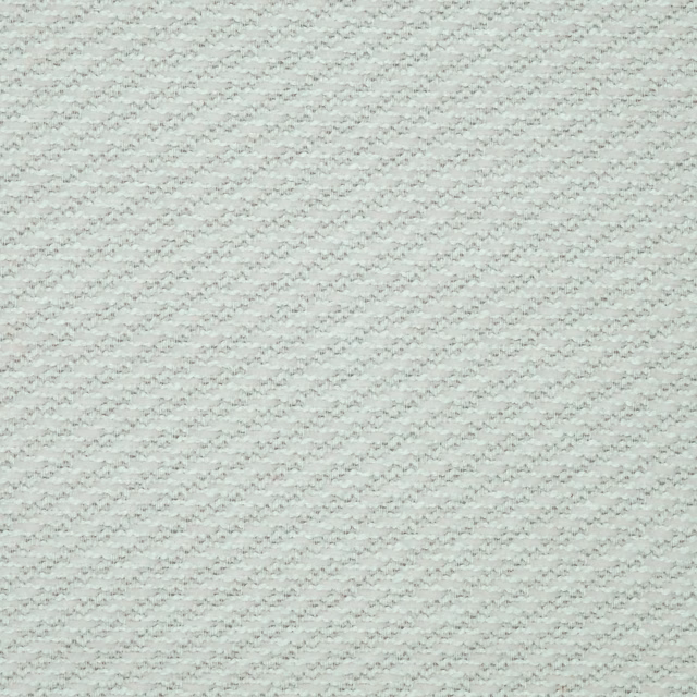 Pale pearl cream woven fabric with fine textured stitch-like surface