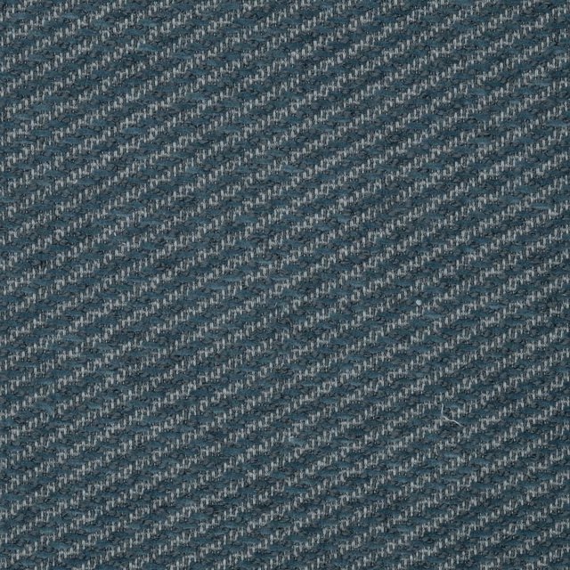 Close-up of a petrol blue woven fabric with diagonal textured flecks