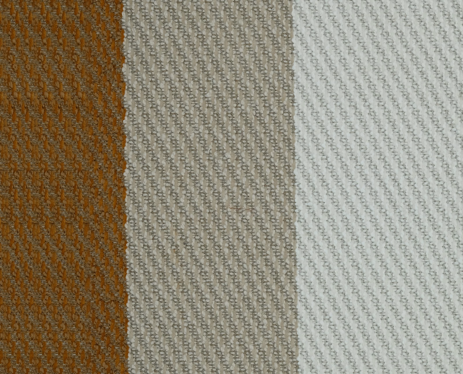 Vertical rust, stone and ivory woven stripes with a textured finish