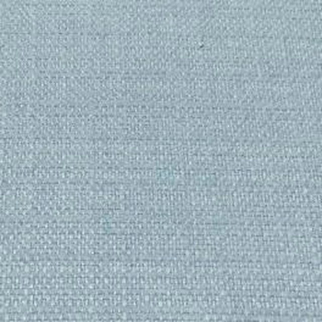 Close-up of pale cornflower blue plain woven fabric with a fine textured surface