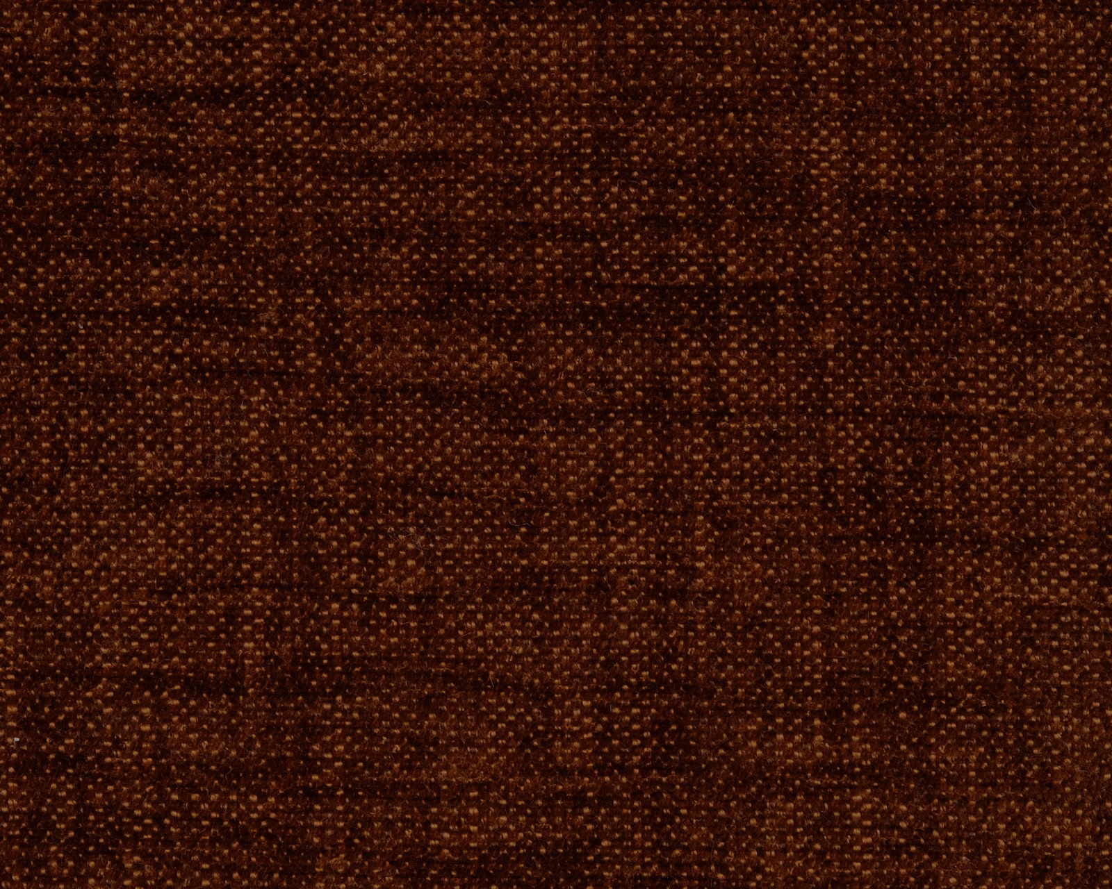 Dark copper-brown plain weave fabric with fine golden flecks and textured surface