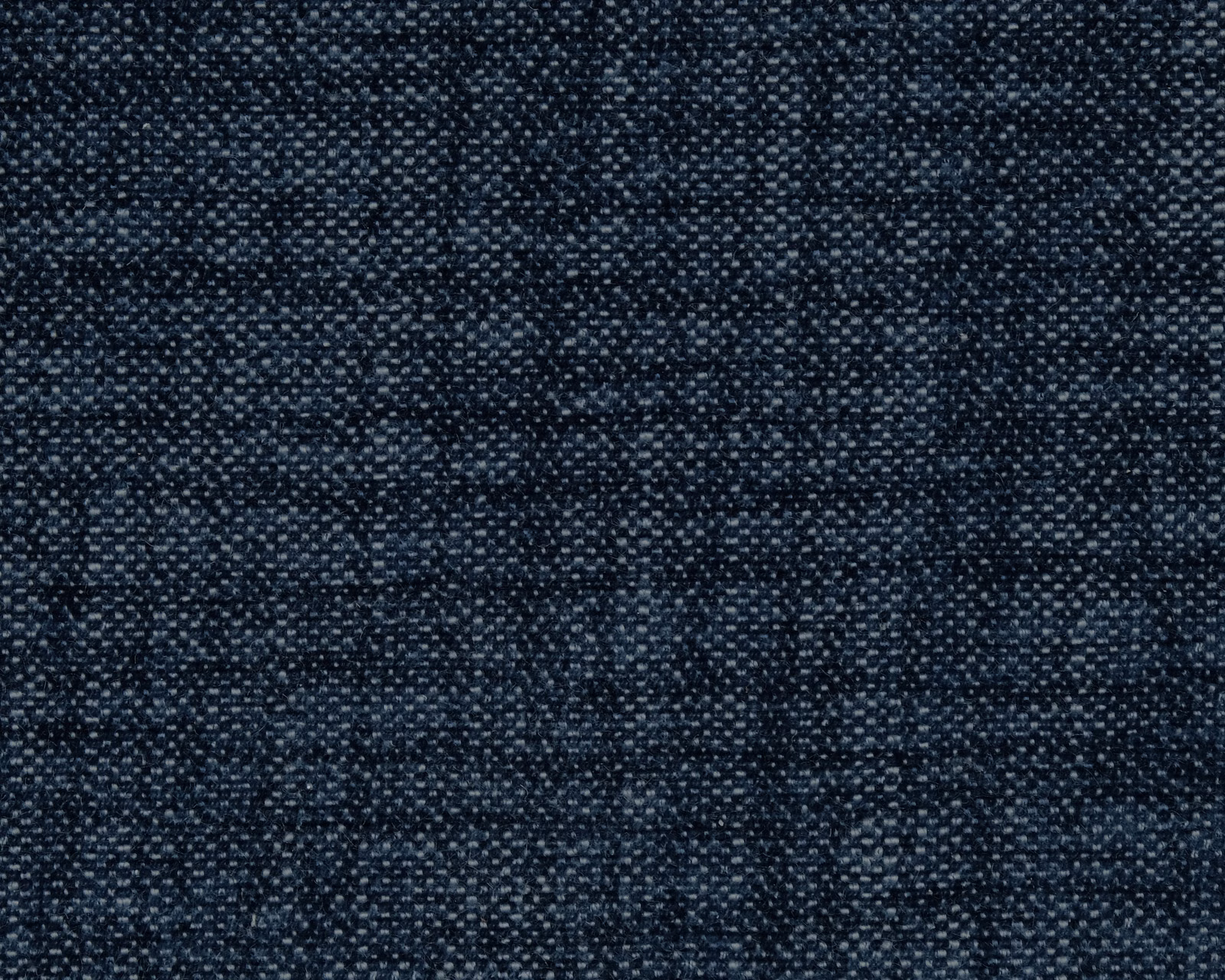 Close-up of deep navy textured plain fabric with fine speckled weave