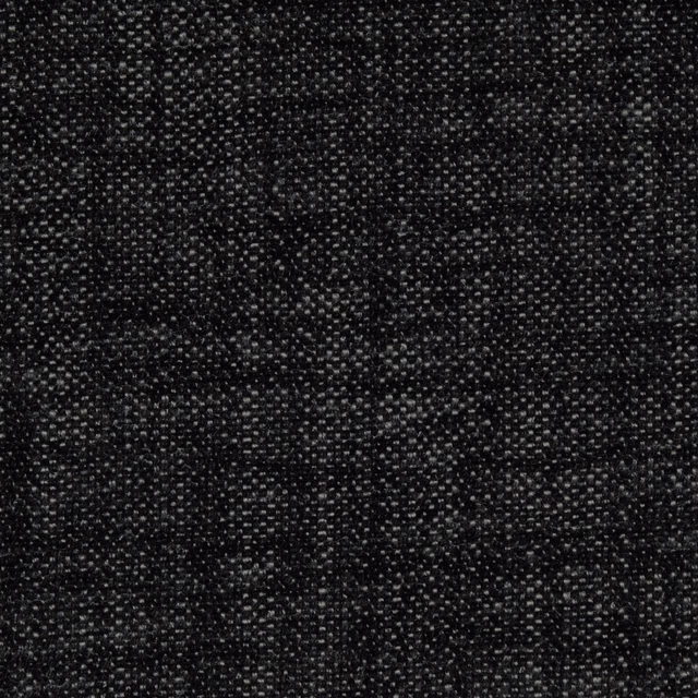 Close-up of a charcoal black textured plain weave with fine speckled highlights