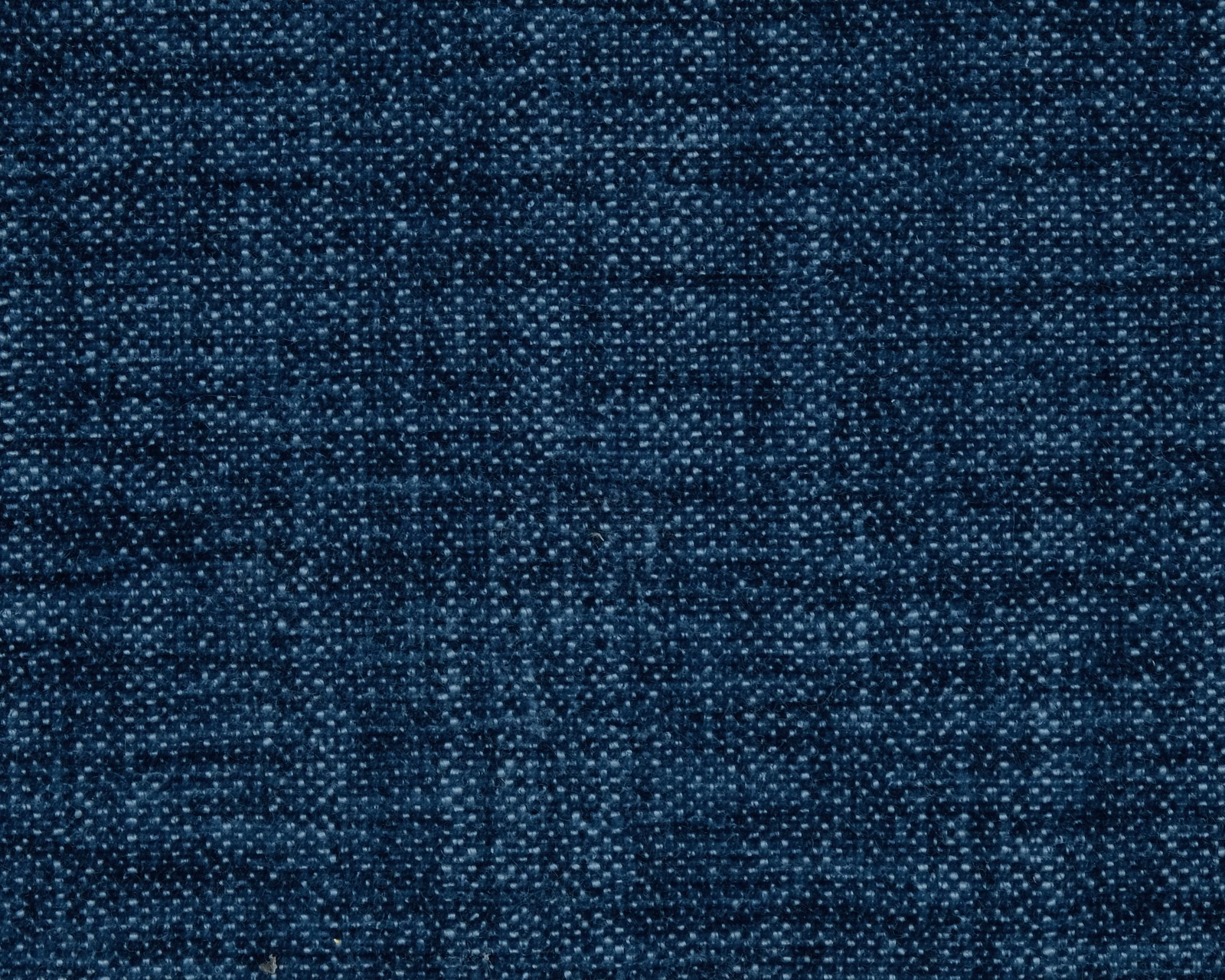 Deep sapphire blue woven plain fabric with subtle speckled texture
