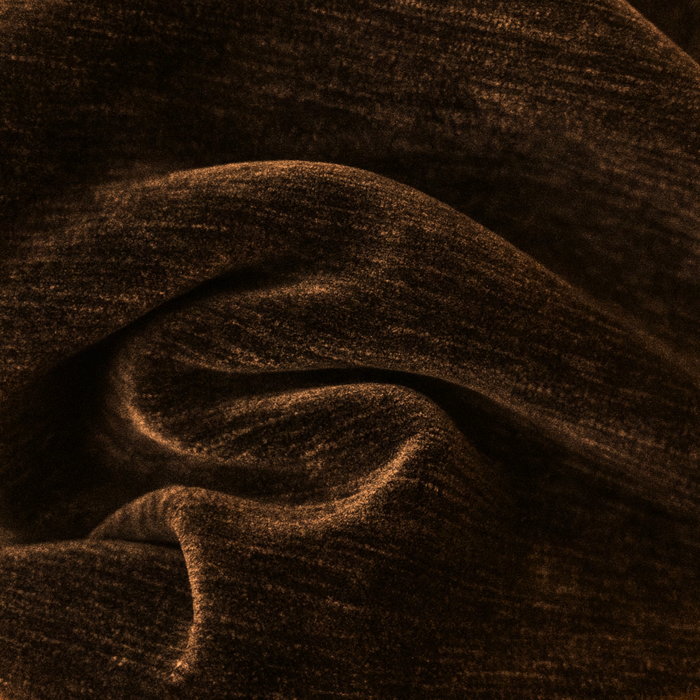 Dark cocoa brown textured fabric with soft bronze highlights in folded drape