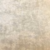Soft almond-cream plain woven fabric with a subtle lustrous texture