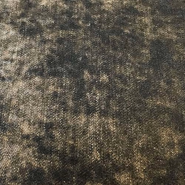 Close-up of a mottled anthracite grey plain fabric with olive undertones