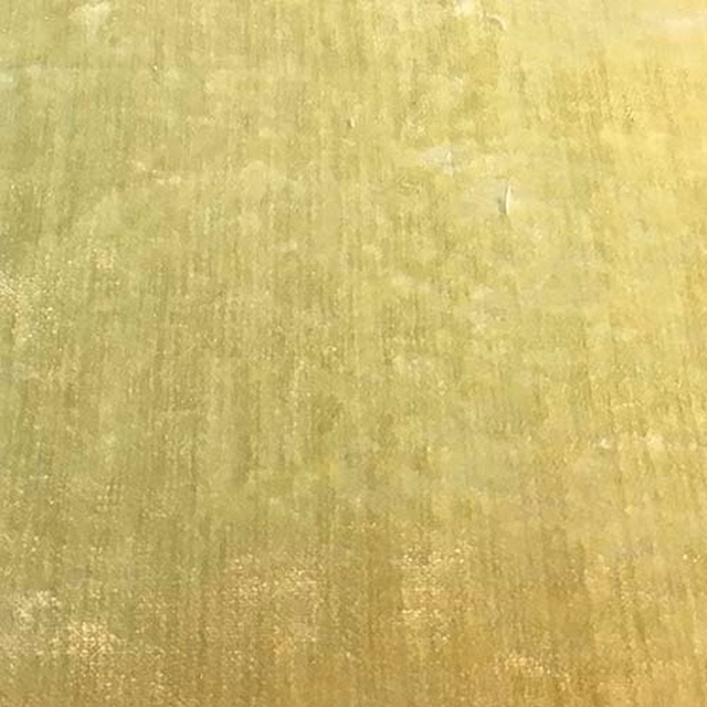 Soft apple-green plain fabric with a subtly brushed, matte texture