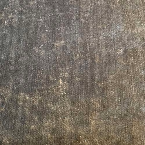 Close-up of a stormy grey-green plain fabric with subtle textured striations