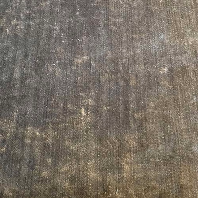 Close-up of a stormy grey-green plain fabric with subtle textured striations